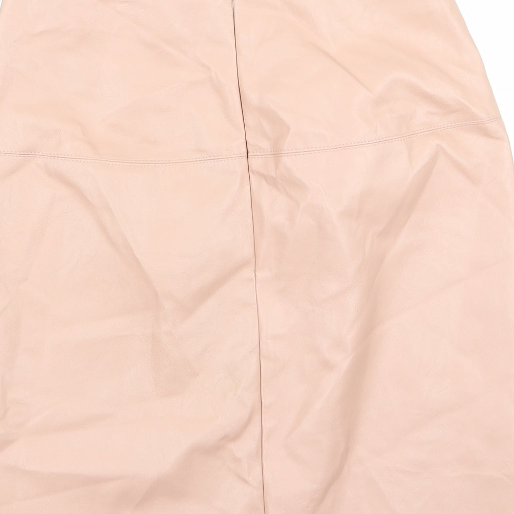 Brand and care label for Missguided women’s beige a-line set, size UK 8