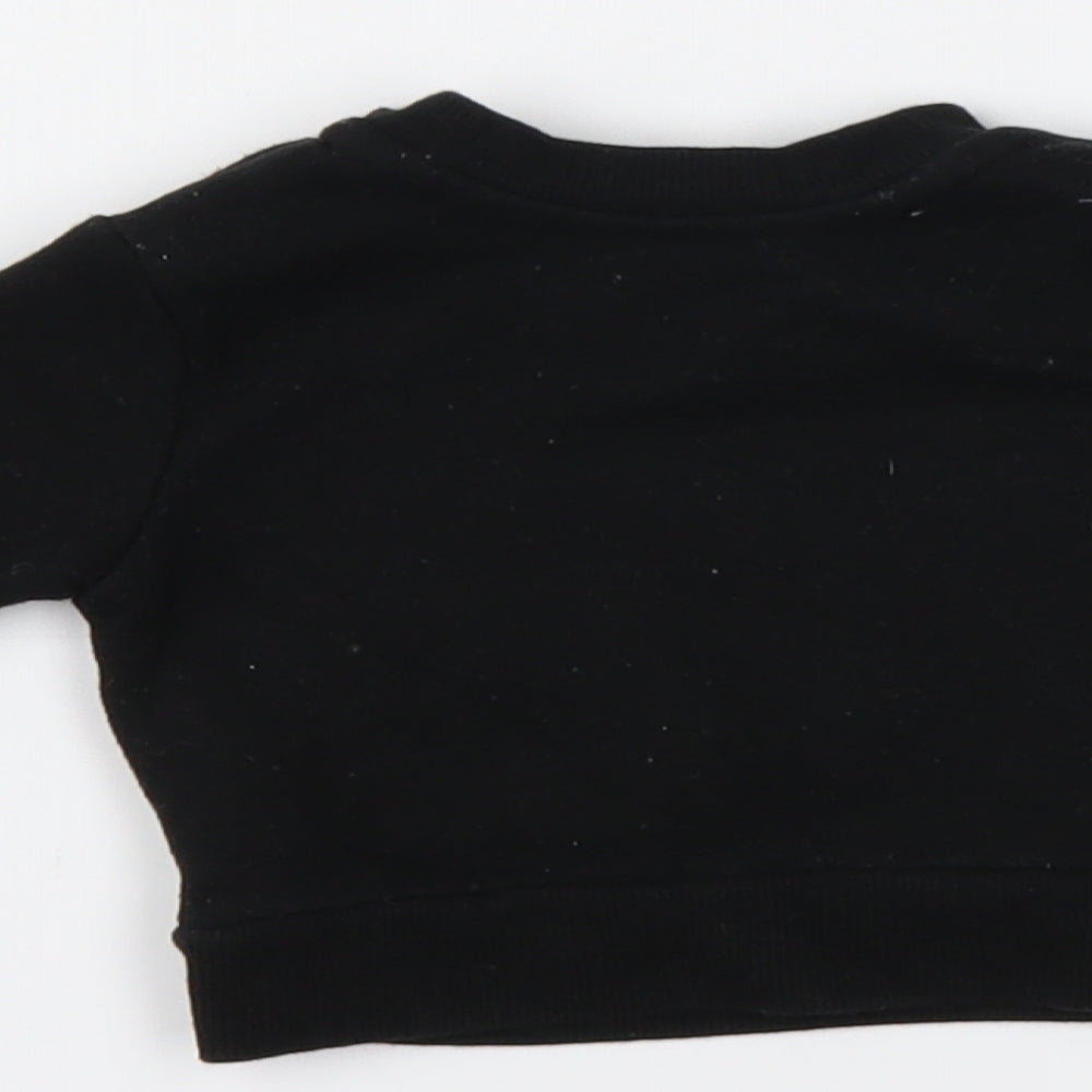 Brand and care label for mini rebel Black jumper, size 0-3, Months