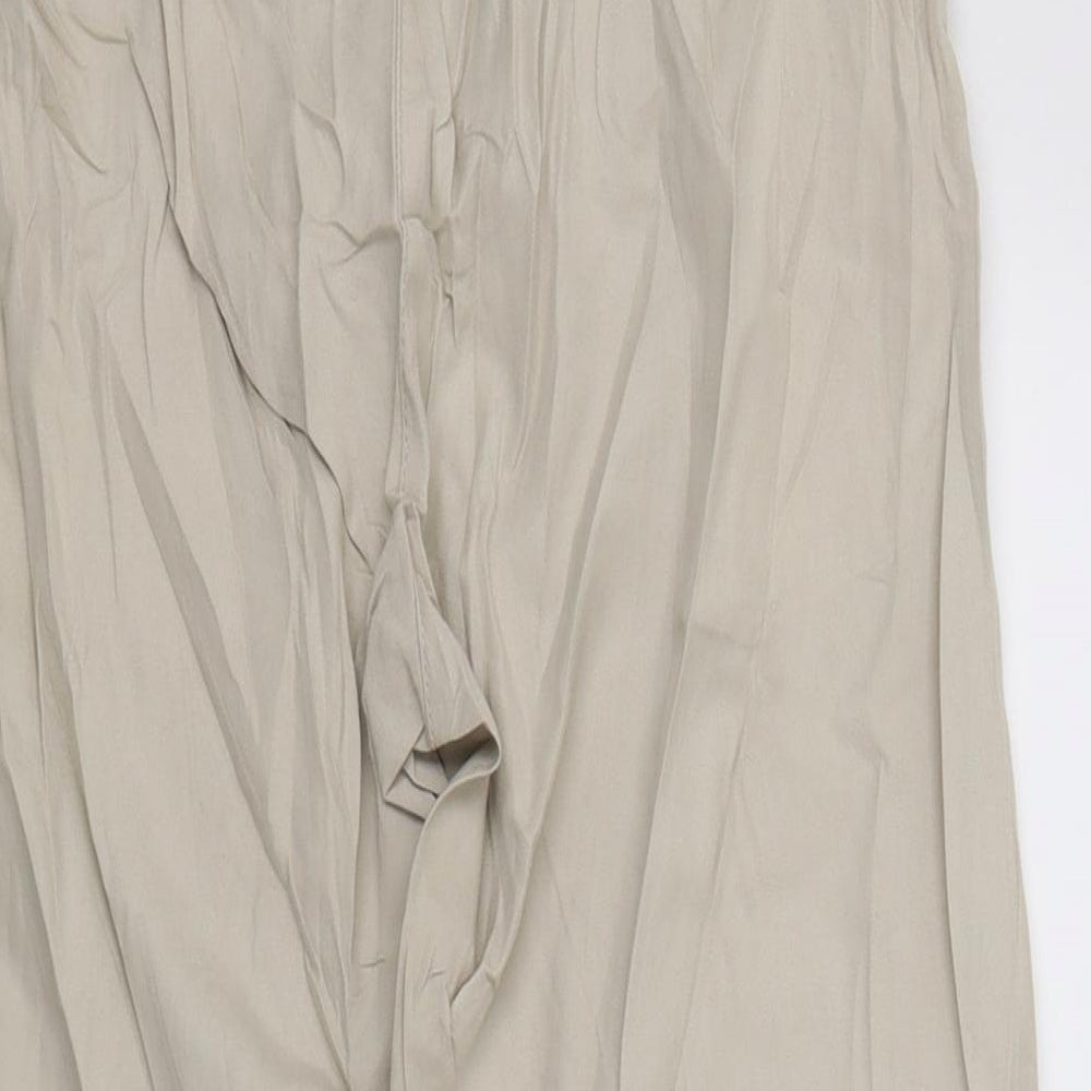 Brand and care label for Evie women’s beige cropped trousers, size UK 8, 20-inch leg