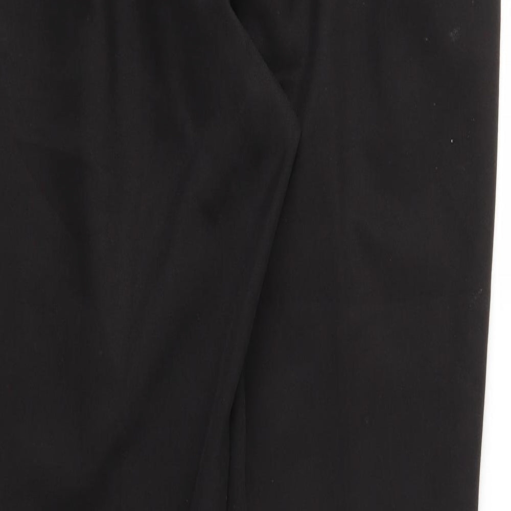 Brand and care label for CANDA women’s black trousers, size UK 12, - stretch waistband