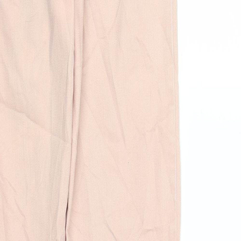 Brand and care label for Vera Moda women’s pink denim skinny jeans, size XS, 30-inch leg
