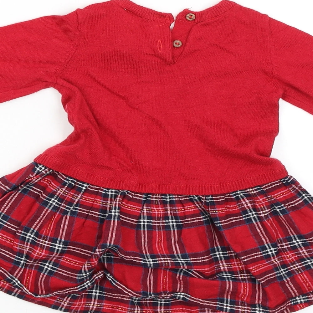 Brand and care label for H&M girls’ red jumper dress, size 3-6, months