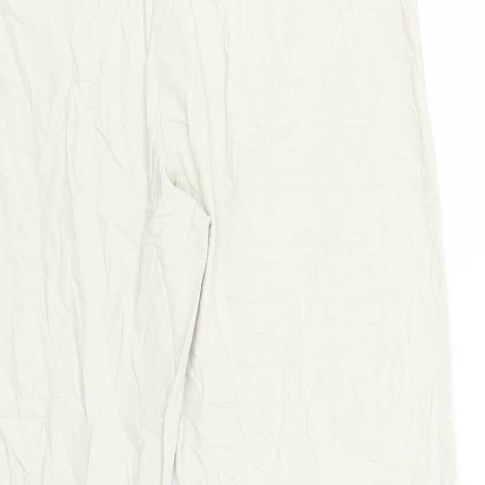 Brand and care label for Papaya women’s ivory trousers, size UK 12, 22-inch leg