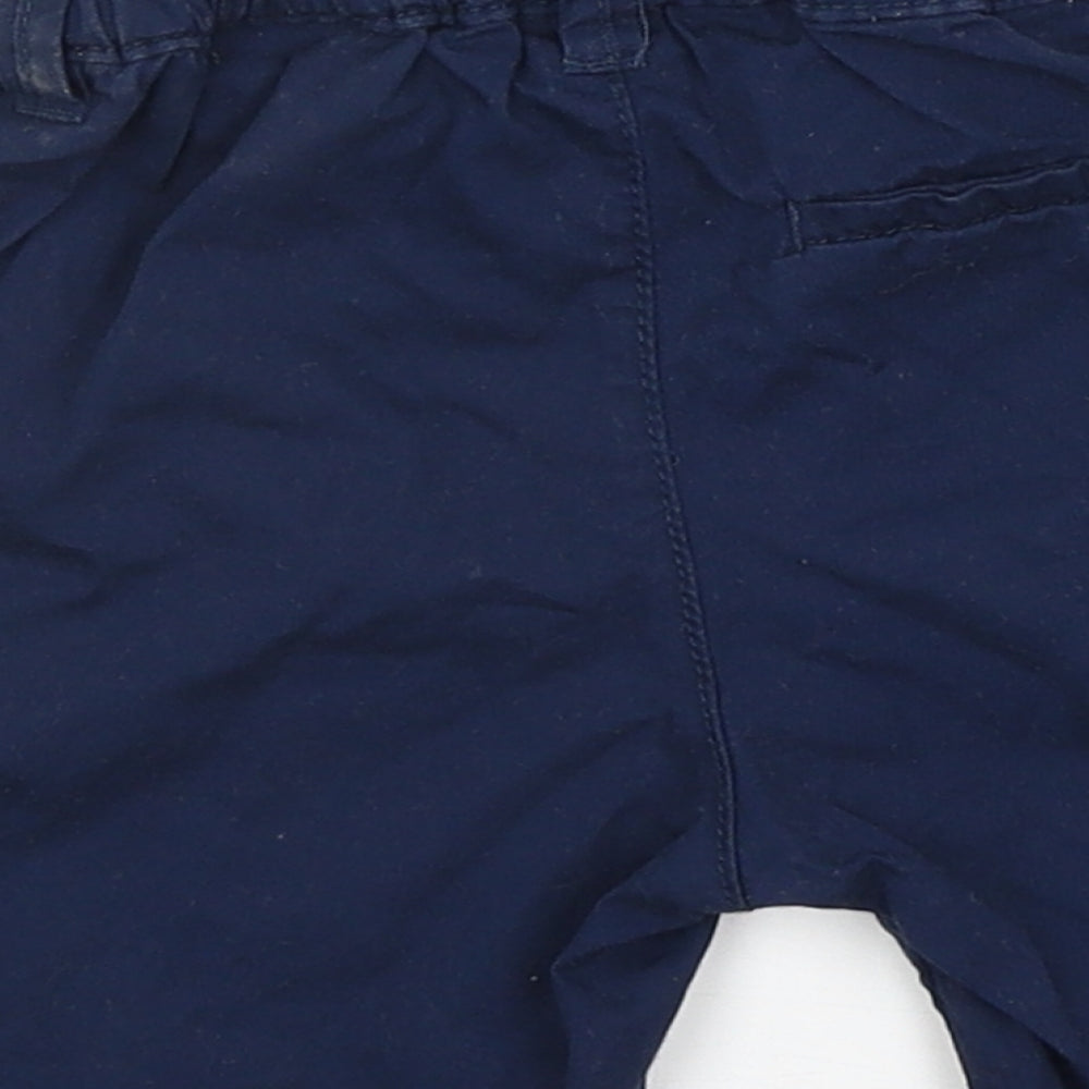 Brand and care label for H&M Baby Blue Cargo Trousers, size 9-12, Months