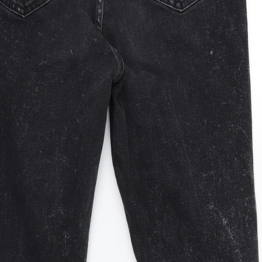 Brand and care label for ASOS women’s black straight jeans, size UK 32, in, 20-inch leg