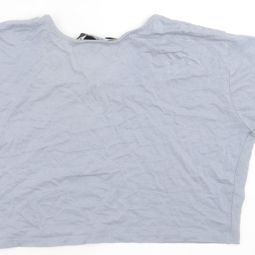 Brand and care label for New Look girls’ blue cropped t-shirt, size 10-11, years