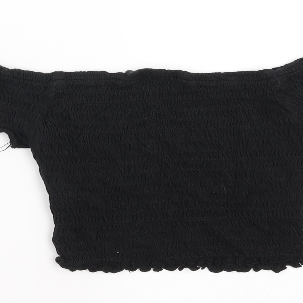 Brand and care label for New Look girls’ black cropped t-shirt, size 10, years