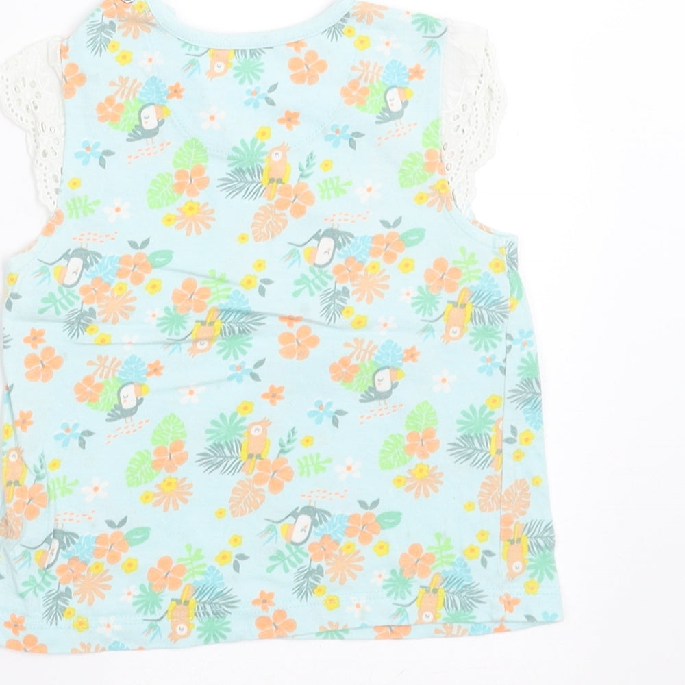 Brand and care label for Nutmeg girls’ green floral basic t-shirt, size 9-12, months - crochet sleeve detail