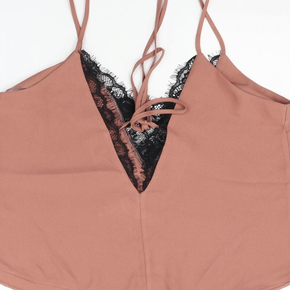 Brand and care label for ASOS women’s gold basic tank, size UK 12