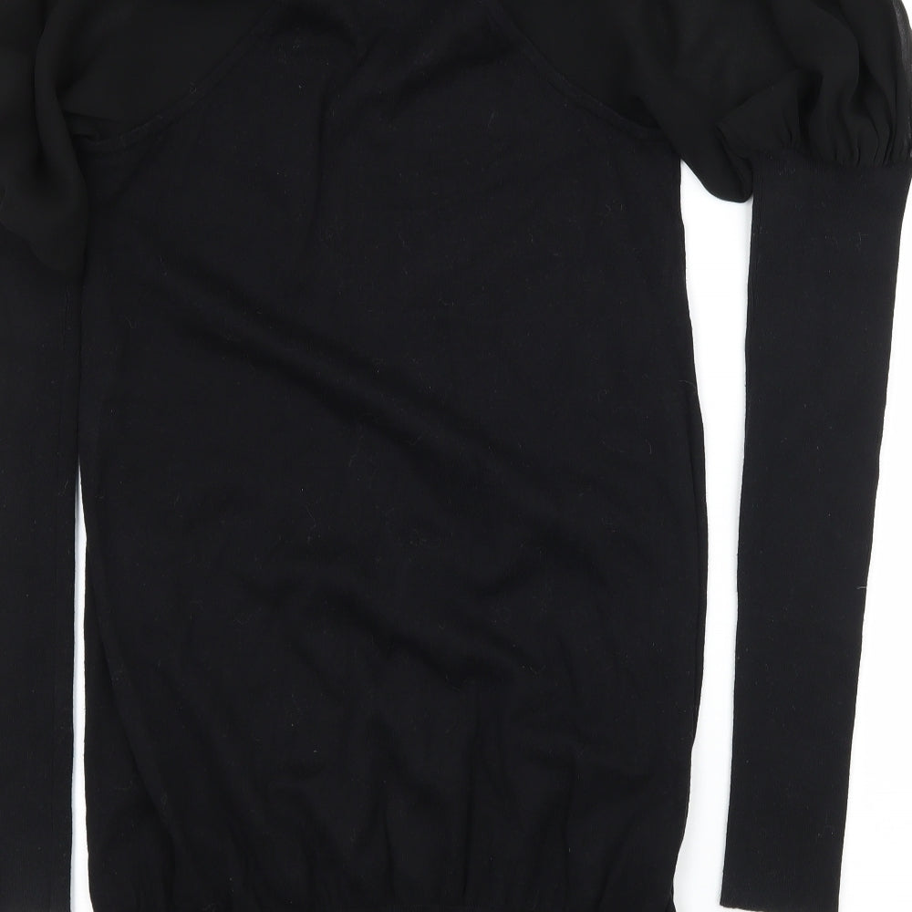 Brand and care label for Miss Selfridge women’s black knit jumper, size UK 10