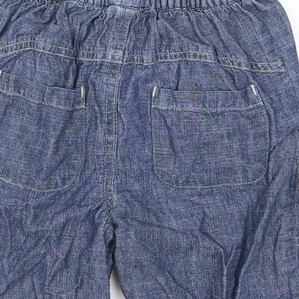 Brand and care label for Mini Mode Baby Blue Denim Cropped Jeans, size 12-18, Months