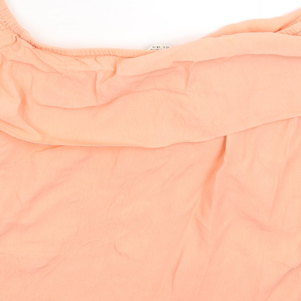 Brand and care label for Miss Selfridge women’s orange basic t-shirt, size UK 10
