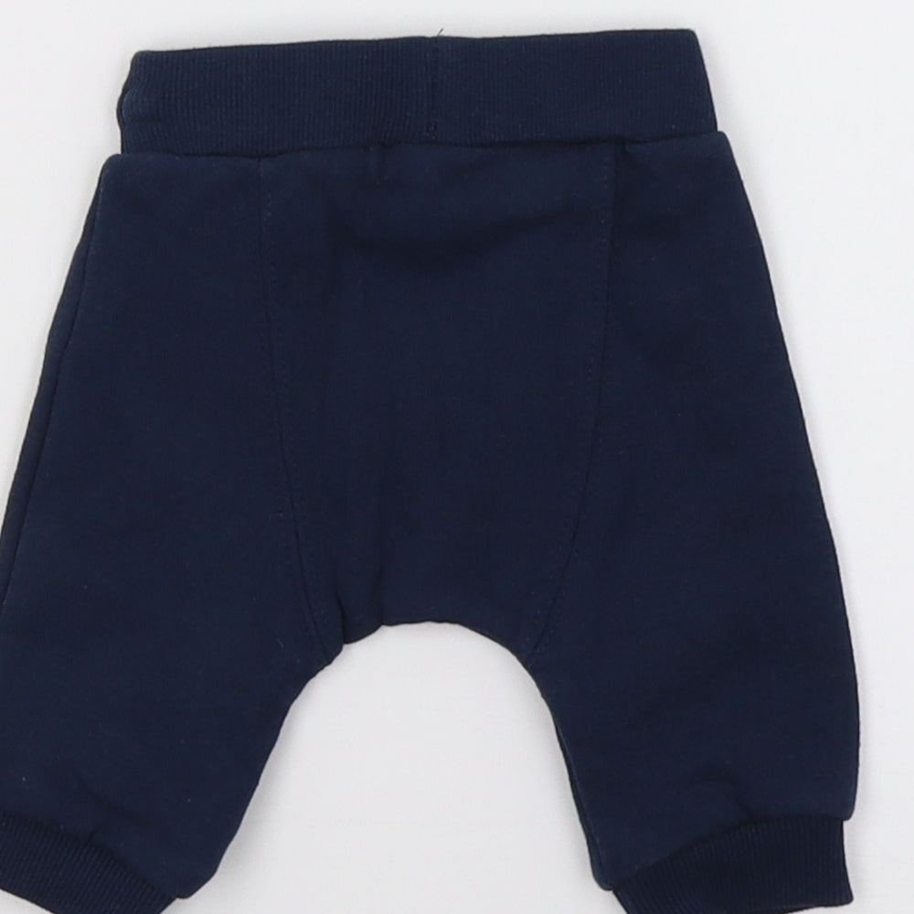 Brand and care label for F&F Baby Blue Jersey Jogger Trousers, size 0-3, Months