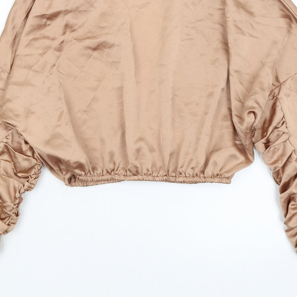 Brand and care label for Miss Pap women’s gold jacket, size UK 12
