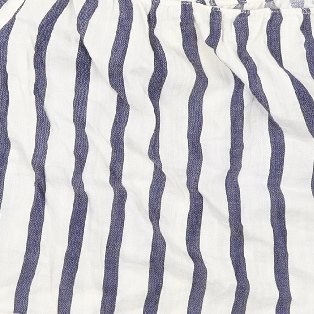 Brand and care label for Miss Selfridge women’s blue striped basic blouse, size UK 10
