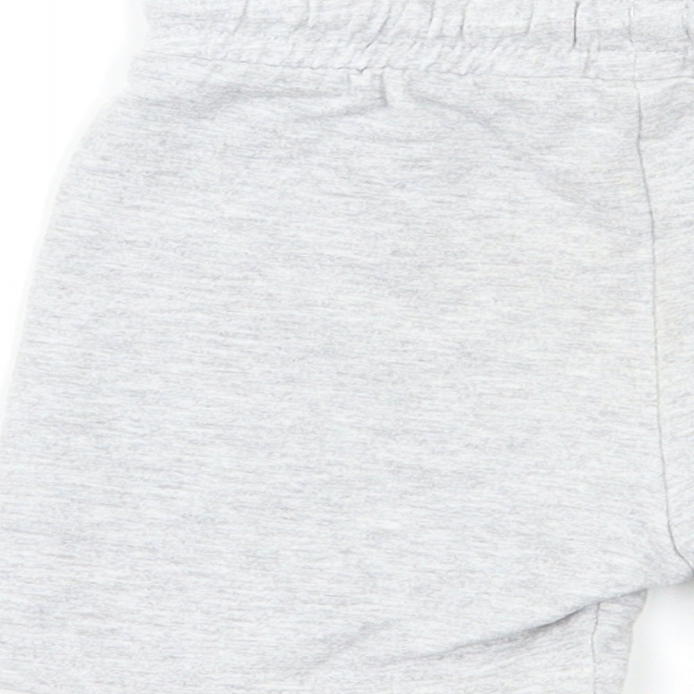 Brand and care label for F&F Baby Grey Cropped Trousers, size 18, Months