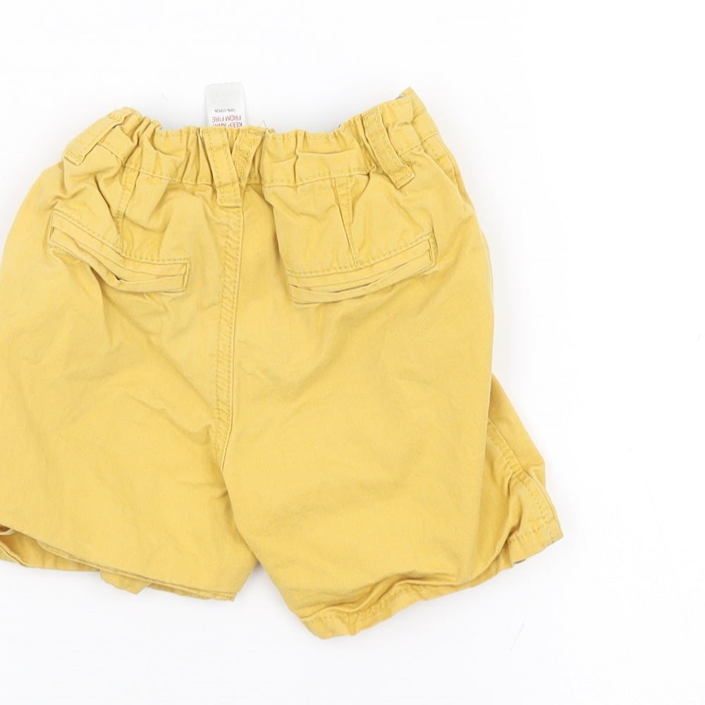 Brand and care label for Tu Baby Yellow Cropped Trousers, size 12-18, Months