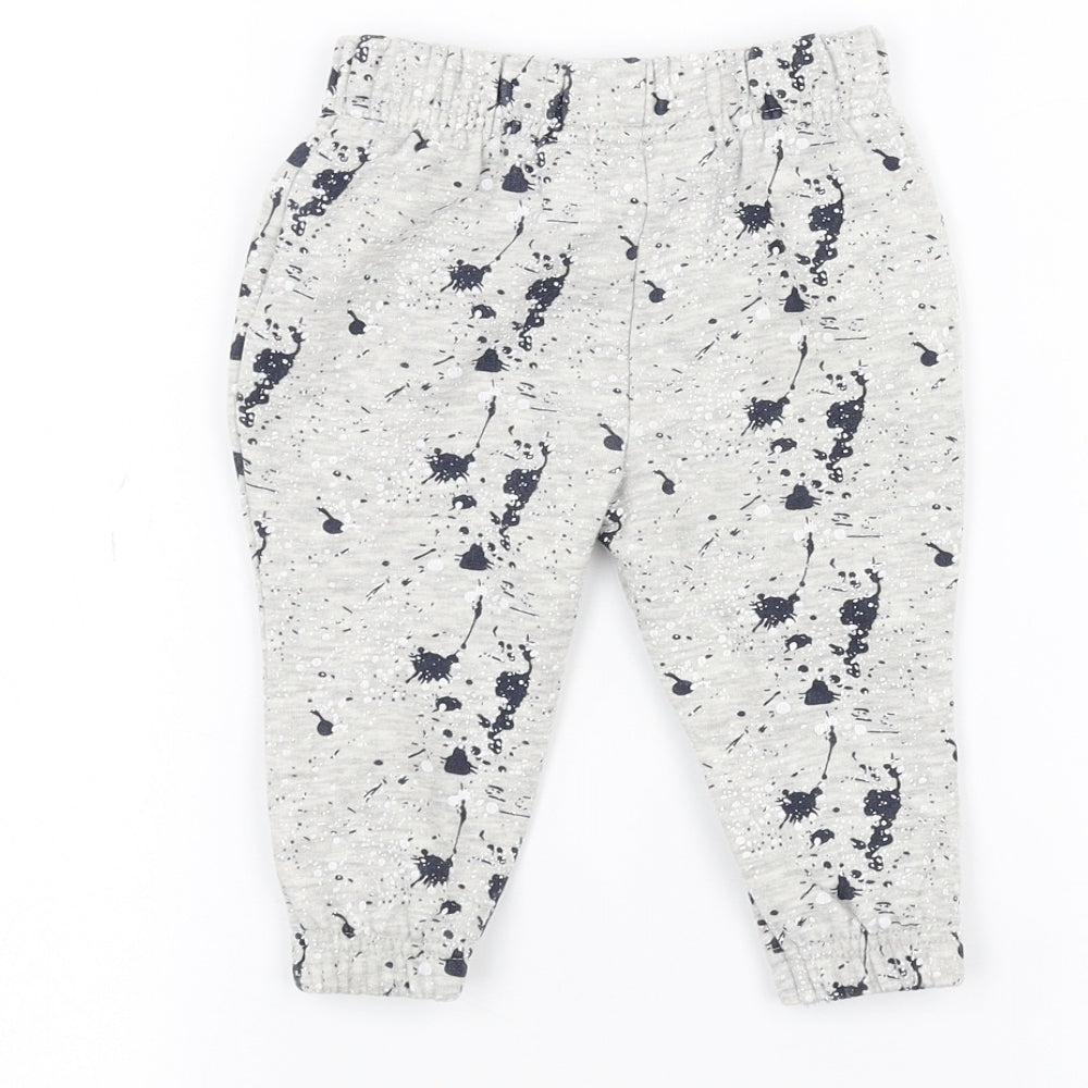 Brand and care label for Primark Baby Grey sweatpants, size 6-9, Months