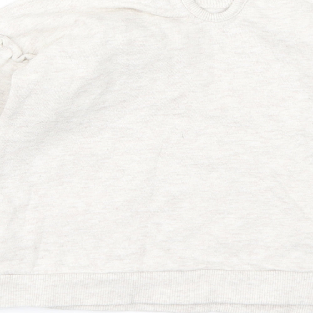 Brand and care label for Disney Baby girls’ brown geometric pullover casual, size 12-18, months - winnie the pooh