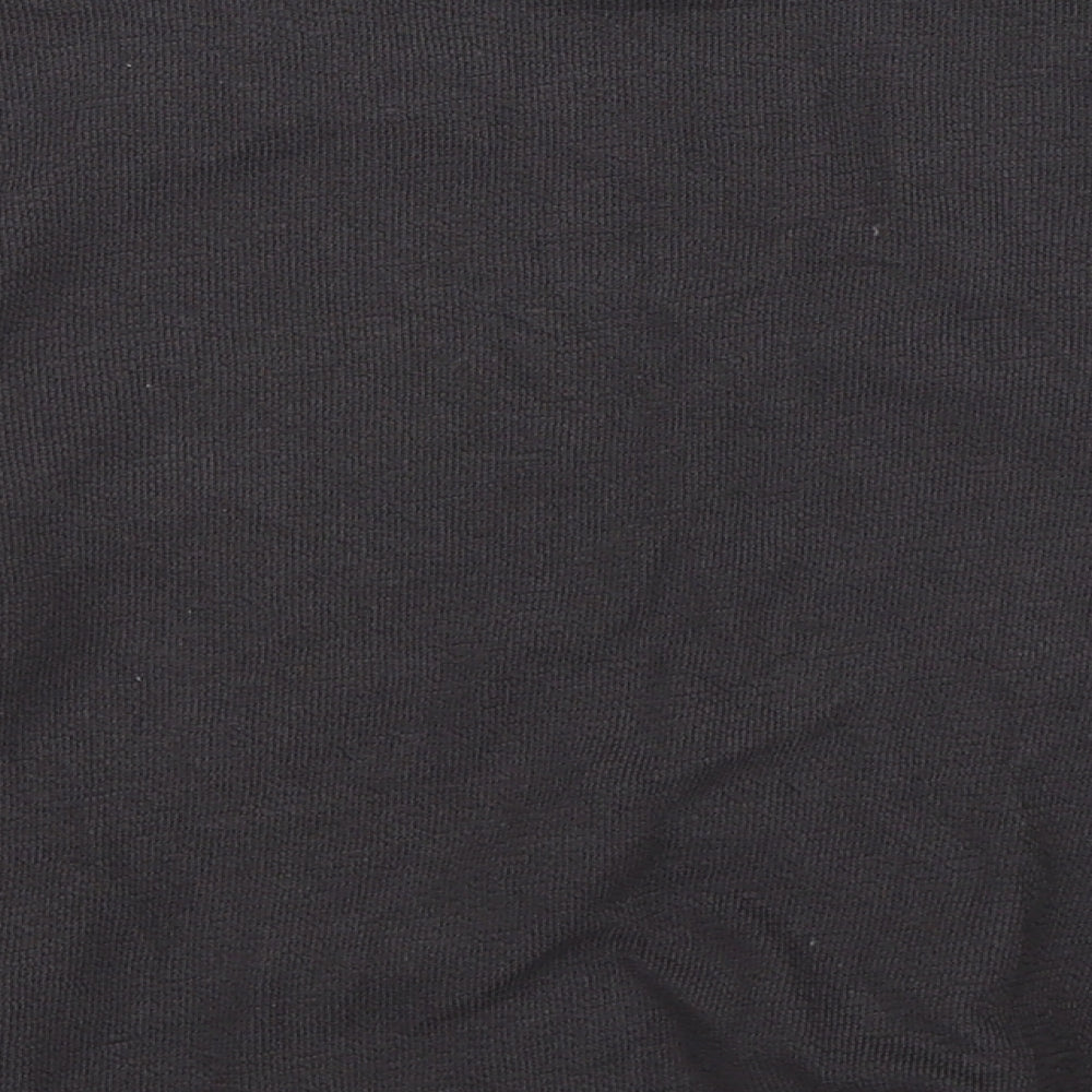 Brand and care label for Zara girls’ black basic t-shirt, size 8, years