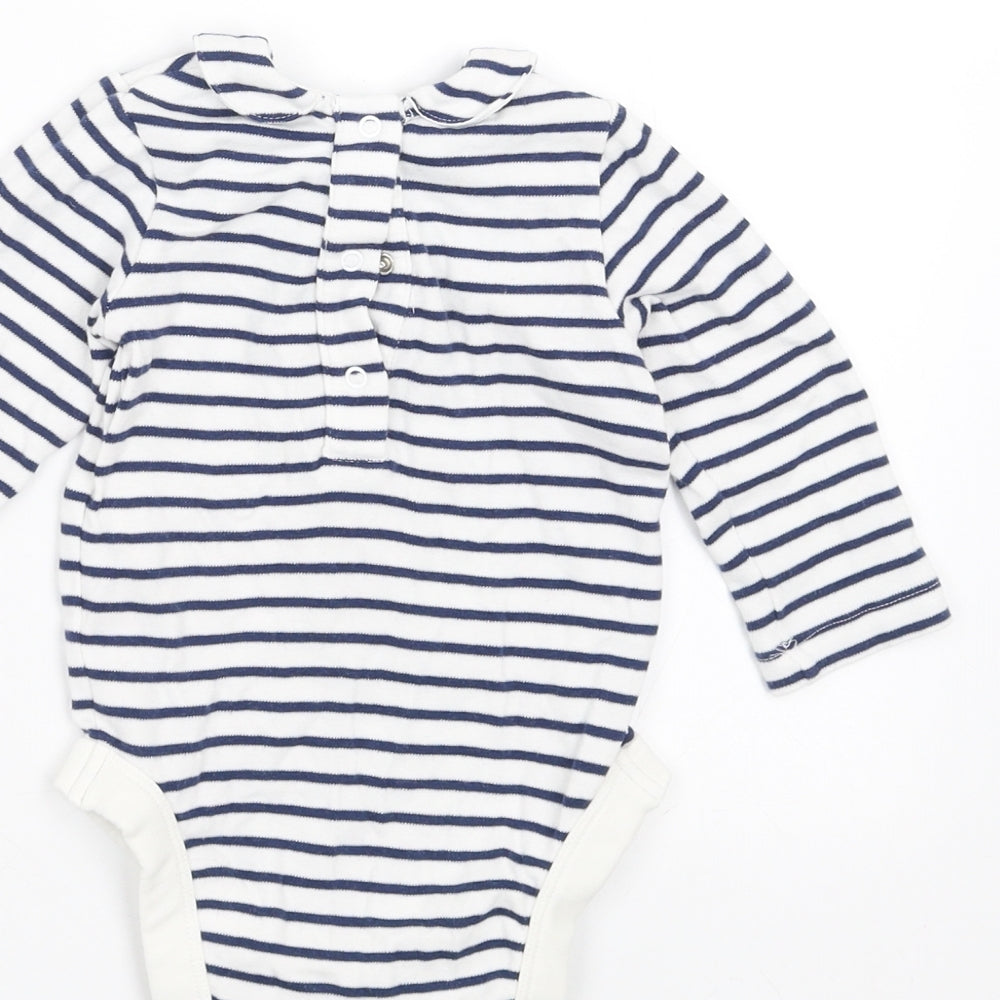 Brand and care label for Marks & Spencer boys’ black striped babygrow one-piece, size 6-9, months