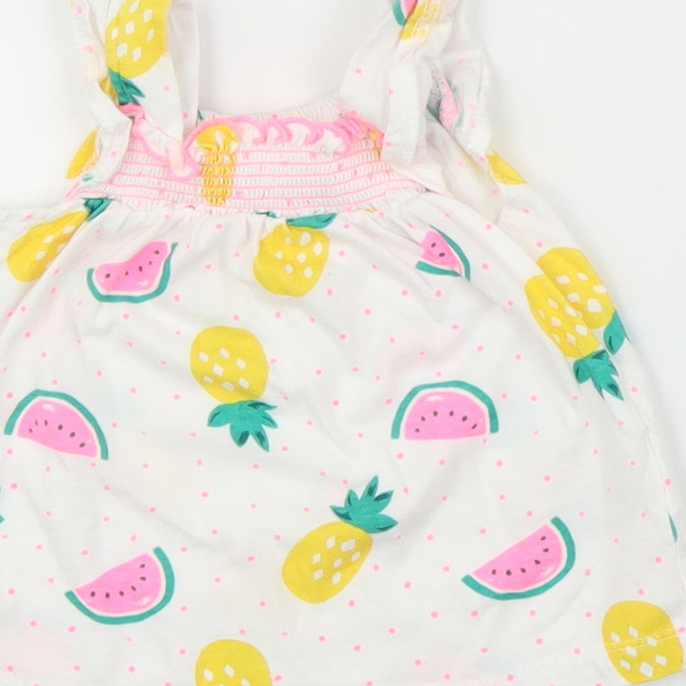 Brand and care label for Preworn girls’ white basic blouse, size 3-6, months - pineapple
