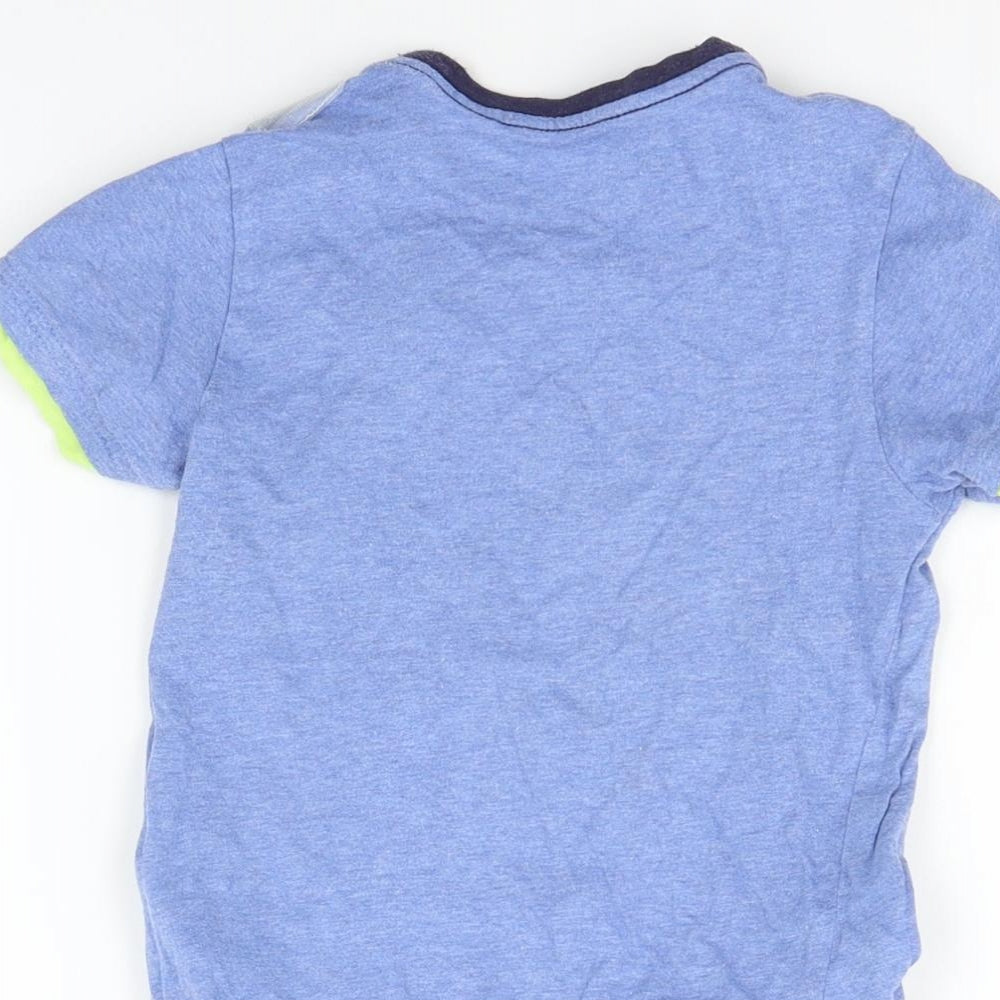 Brand and care label for Marks & Spencer girls’ blue basic polo, size 3-4, years