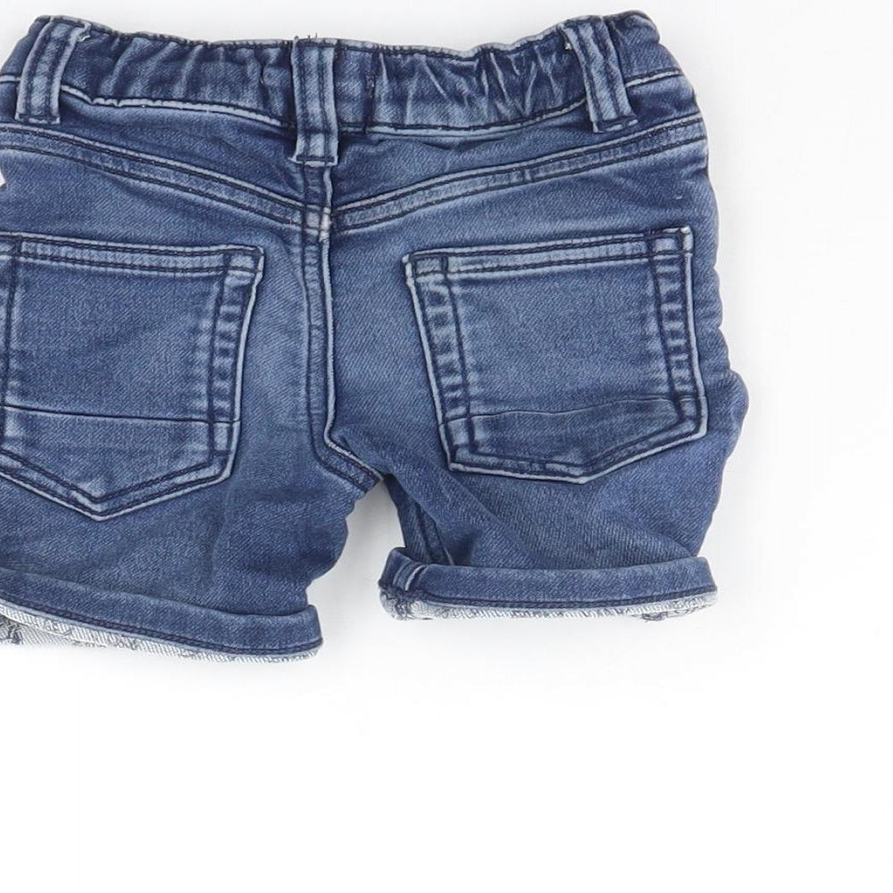 Brand and care label for Blue Zoo boys’ blue cropped jeans, size 18, months