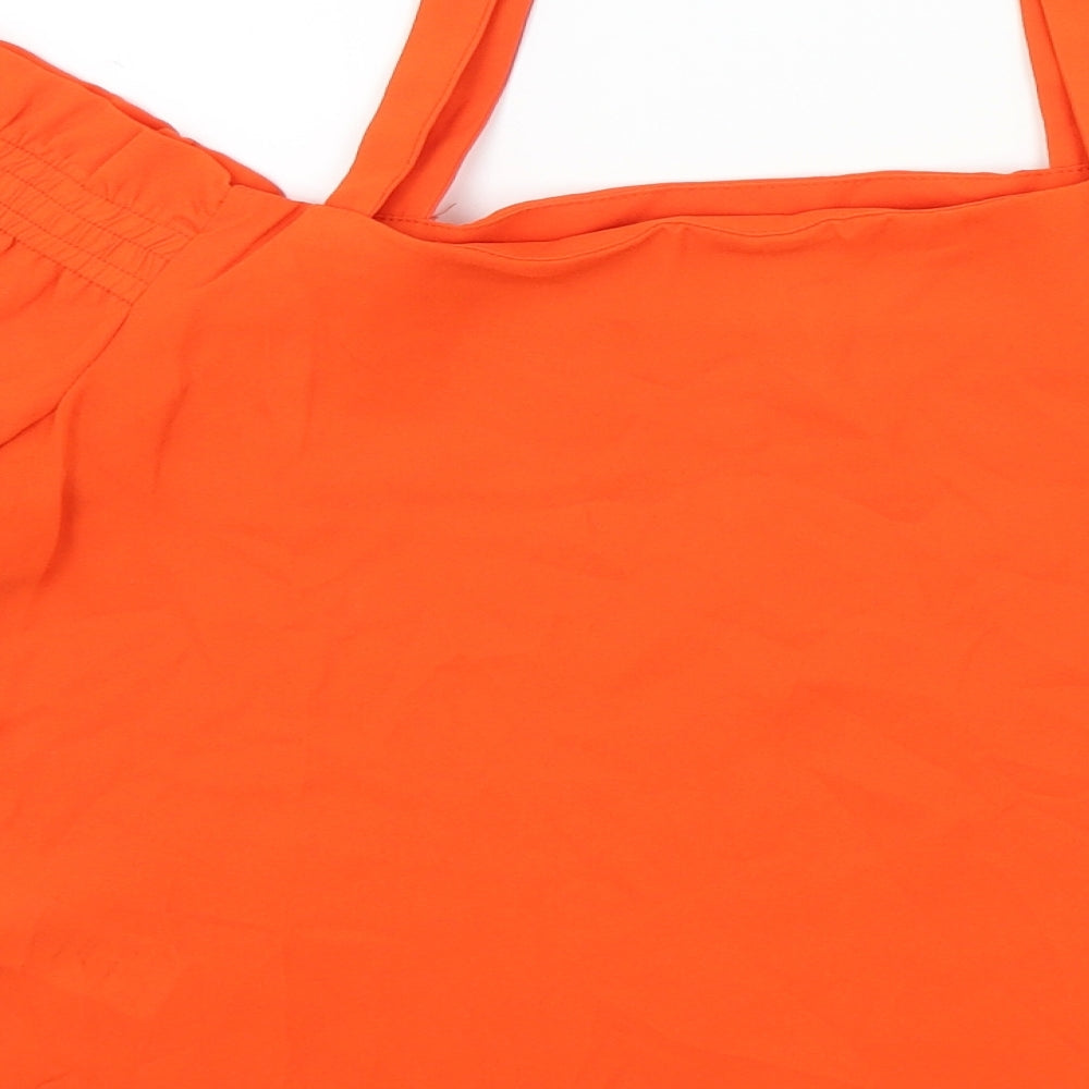Brand and care label for New Look girls’ orange colourblock camisole blouse, size 12, years
