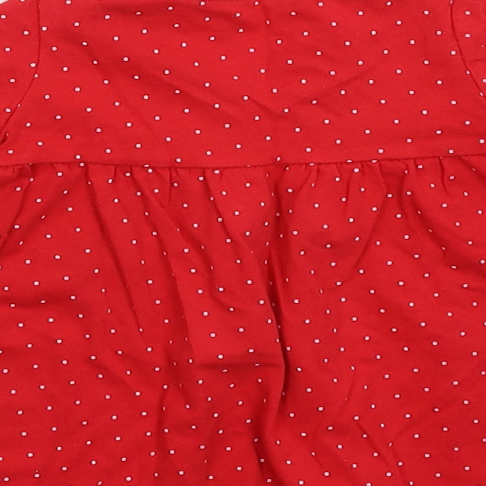 Brand and care label for Fred & Flo girls’ red spotted fit & flare, size 3-6, months