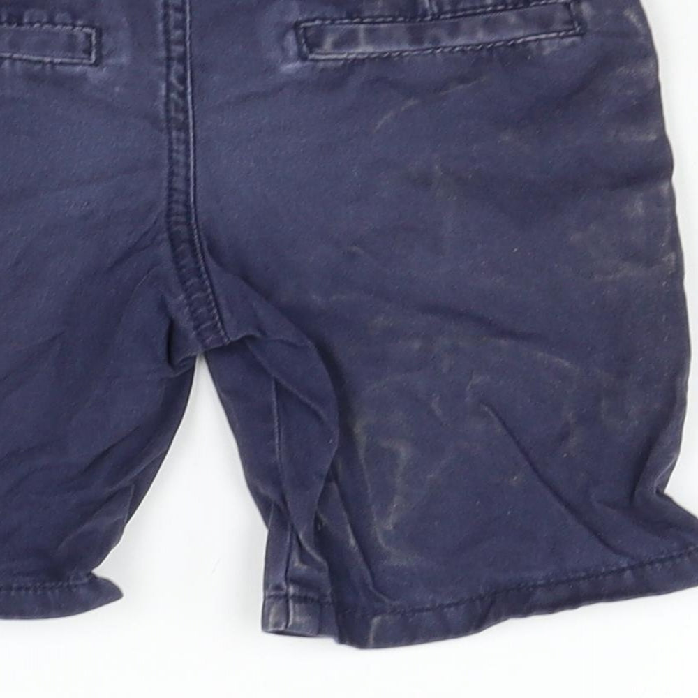 Brand and care label for Denim & Co. girls’ blue chino trousers, size 3-4, years