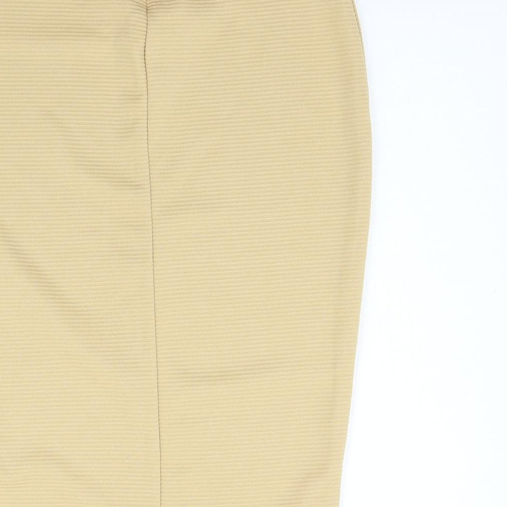 Brand and care label for Missguided women’s beige flare skirt, size UK 10