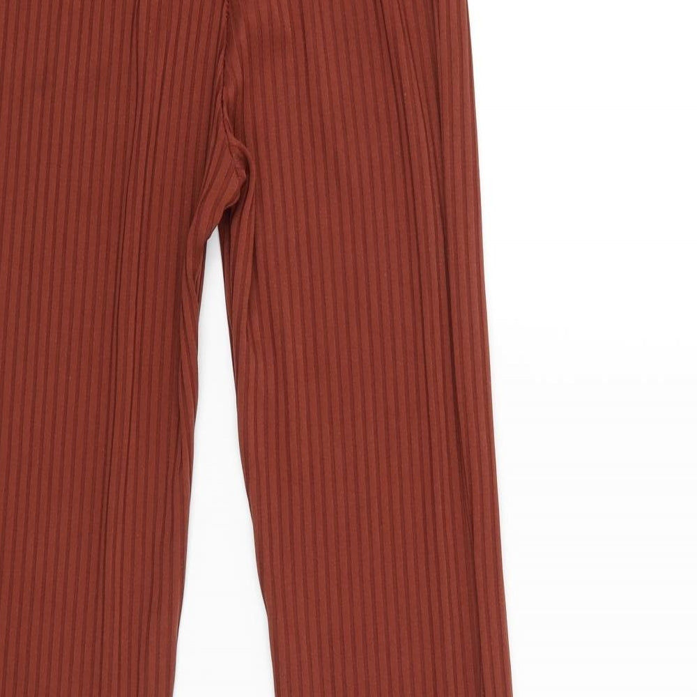 Brand and care label for Club London women’s brown capri trousers, size UK 8, 35-inch leg
