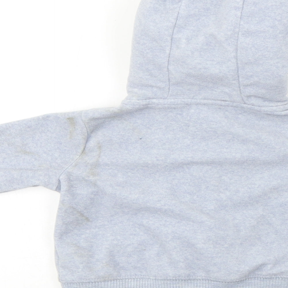 Brand and care label for Carter boys’ blue full zip jumper, size 3-6, months