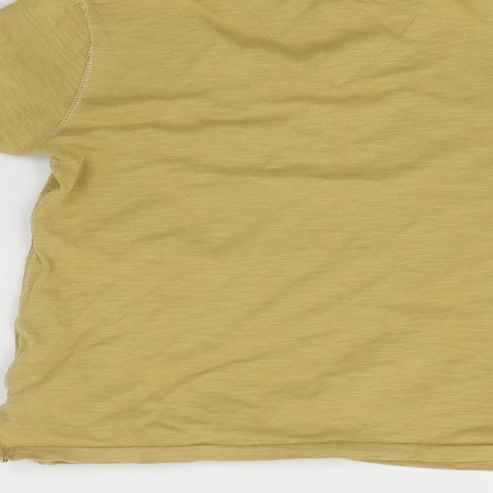 Brand and care label for Next girls’ beige basic t-shirt, size 3, years