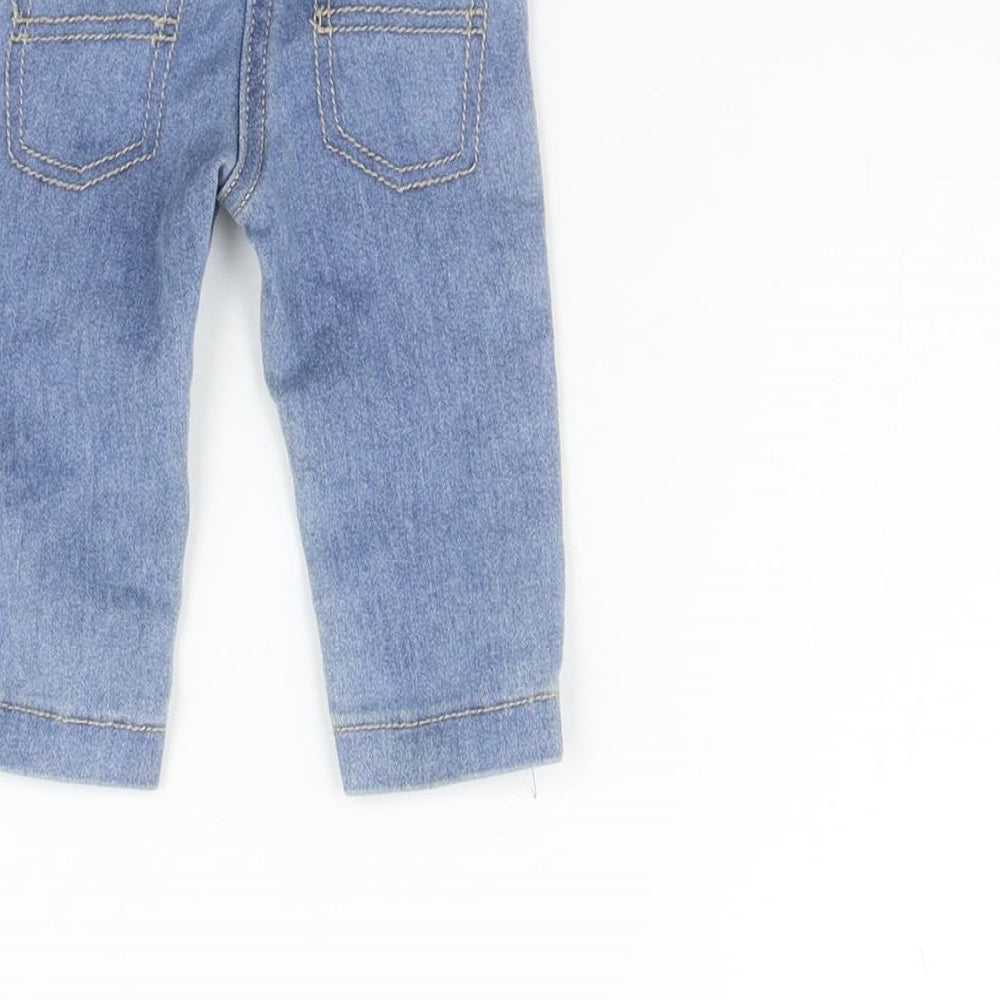Brand and care label for Monsoon girls’ blue cargo jeans, size 0-3, months