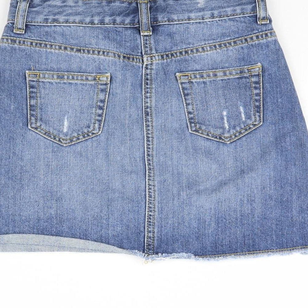 Brand and care label for Denim & Co. girls’ blue denim mini skirt, size 10, years