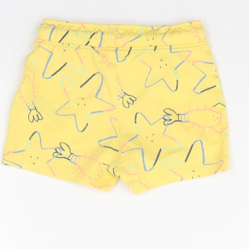 Brand and care label for Marks & Spencer Baby Yellow Spotted Cropped Trousers, size 9, Months - sea life