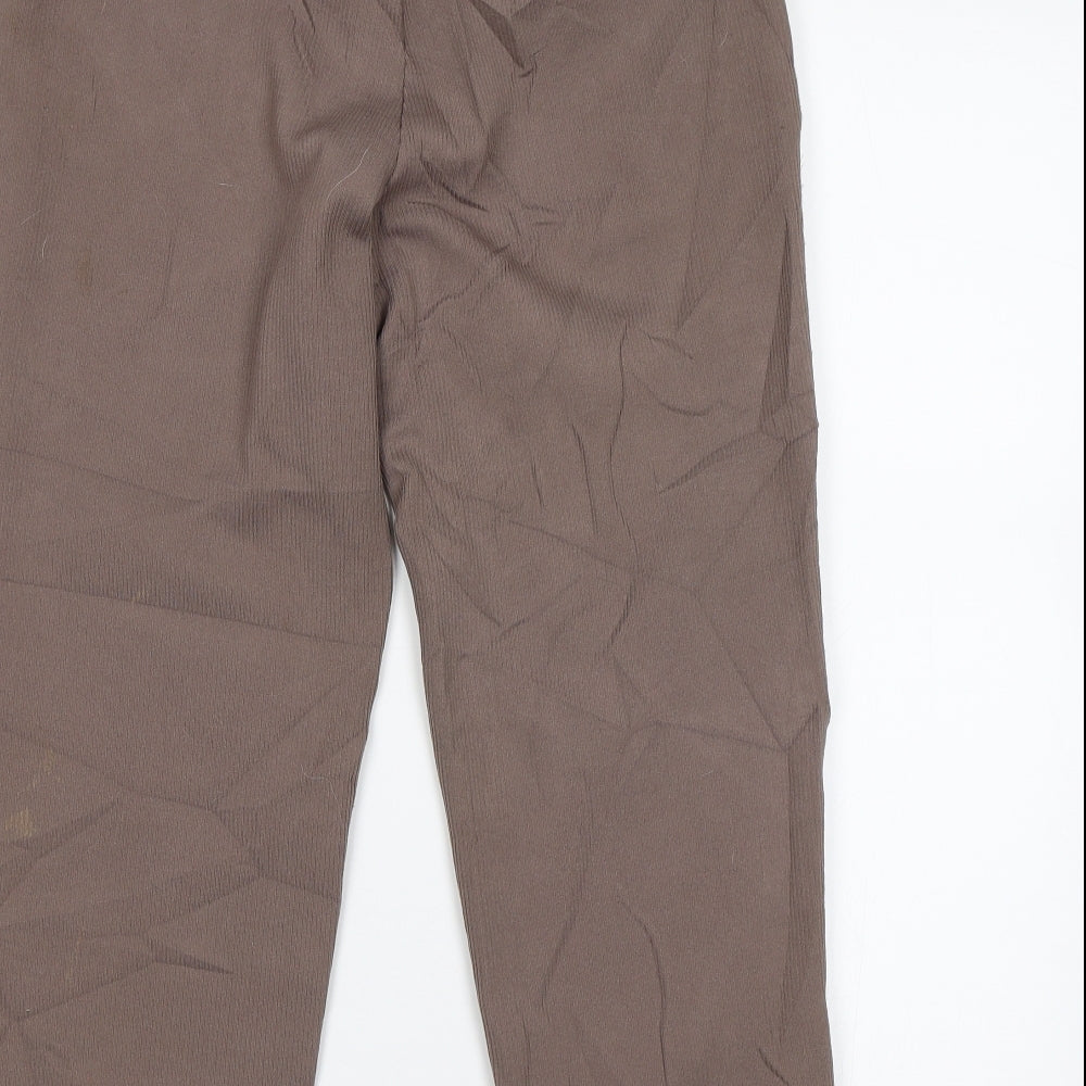 Brand and care label for C&A women’s brown trousers, size UK 18, 23-inch leg