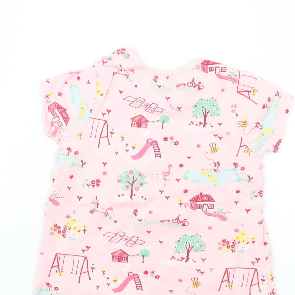 Brand and care label for Nutmeg girls’ pink t-shirt dress, size 9-12, months