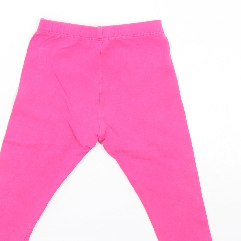Brand and care label for Mini Club girls’ pink sweatpants leggings, size 9-12, months