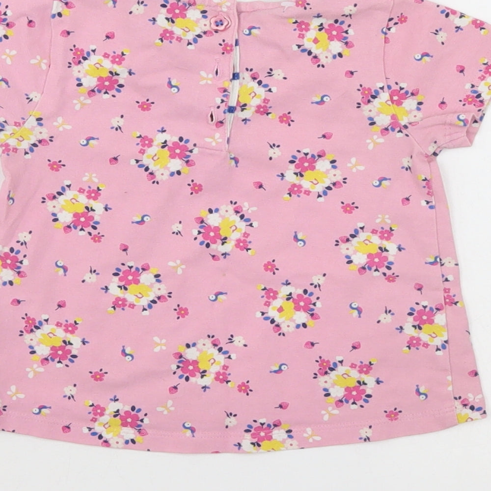 Brand and care label for Mini Club girls’ pink floral pinafore/dungaree dress, size 9-12, months