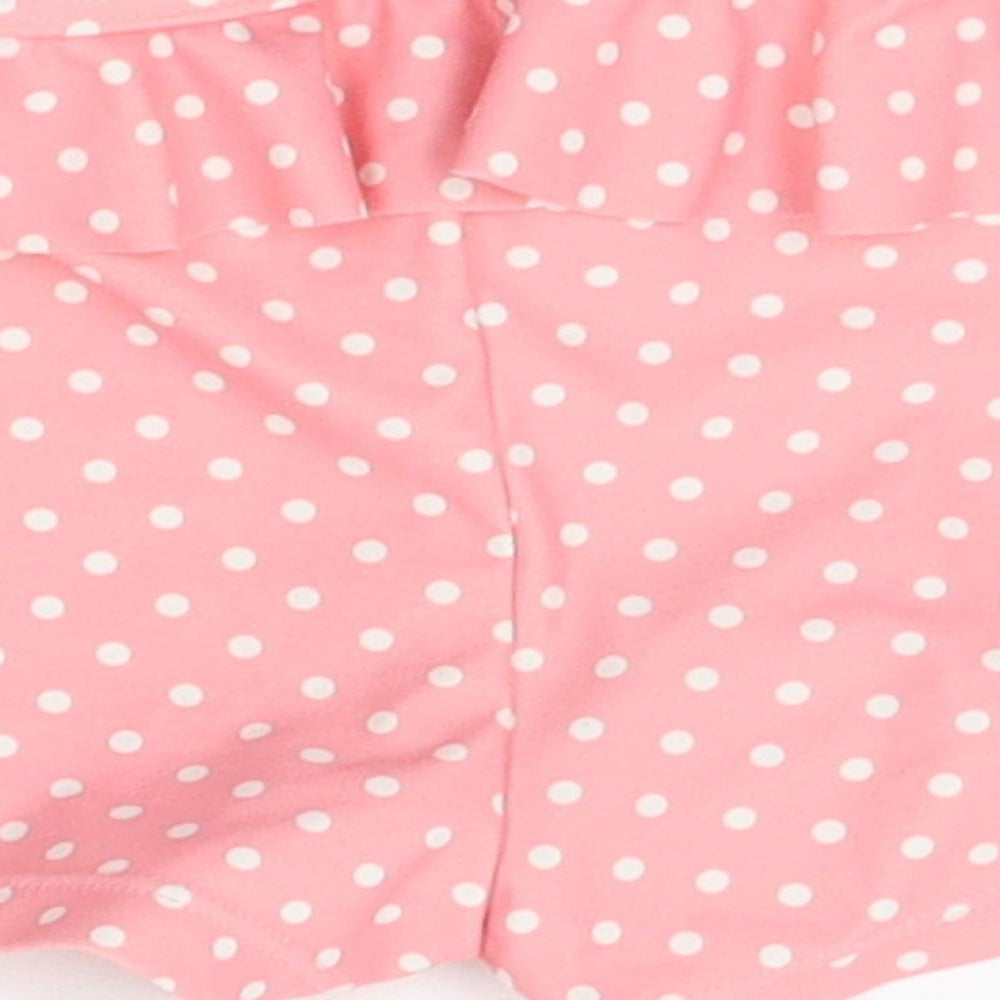 Brand and care label for Mothercare girls’ pink polka dot pyjama pants, size 9-12, months - night shorts