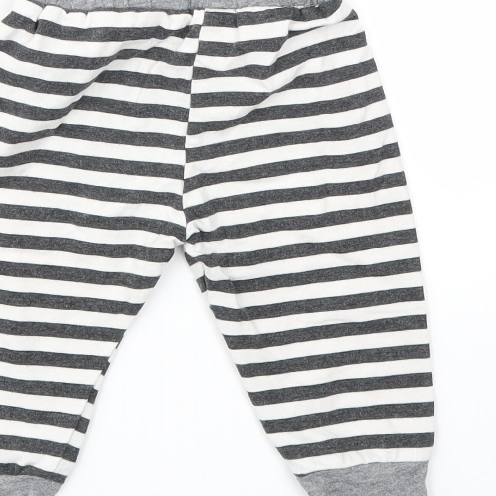 Brand and care label for Preworn boys’ black striped capri leggings, size 3-6, months