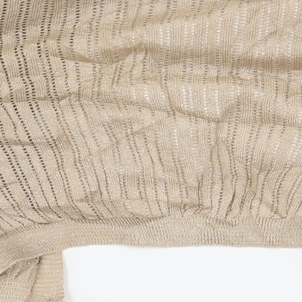 Brand and care label for Miss Selfridge women’s beige cape jumper, size UK 10