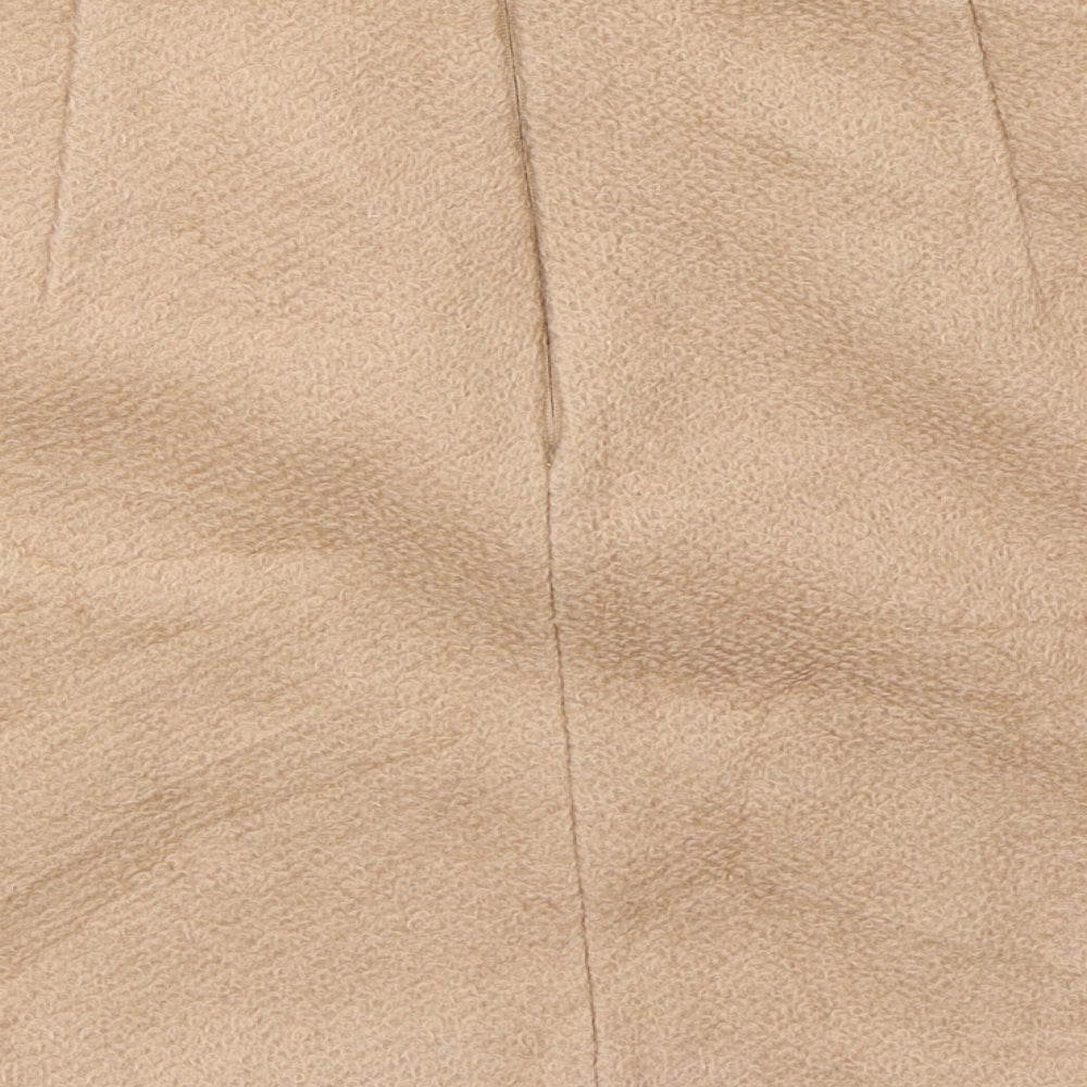 Brand and care label for ASOS women’s beige mini skirt, size UK 10