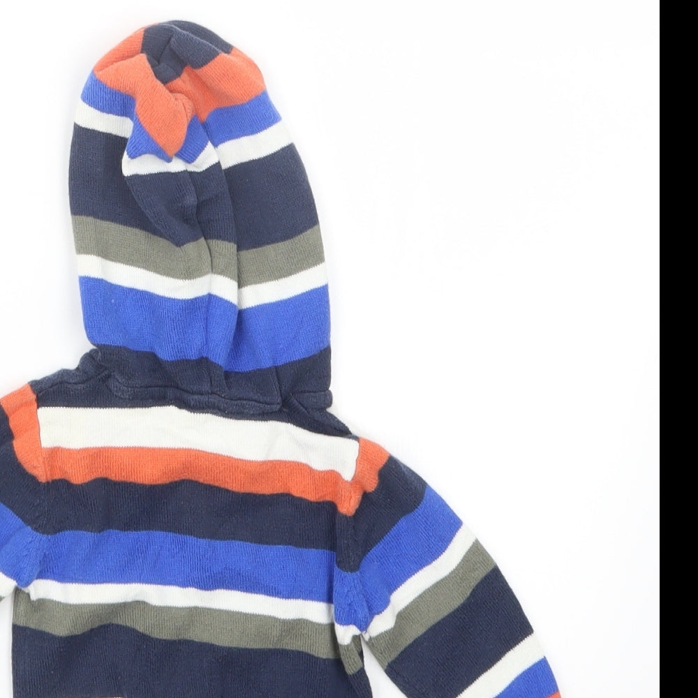 Brand and care label for C&A boys’ blue striped knit jumper, size 3-6, months