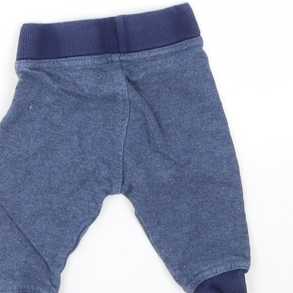 Brand and care label for LILY&DAN boys’ blue capri leggings, size 3-6, months