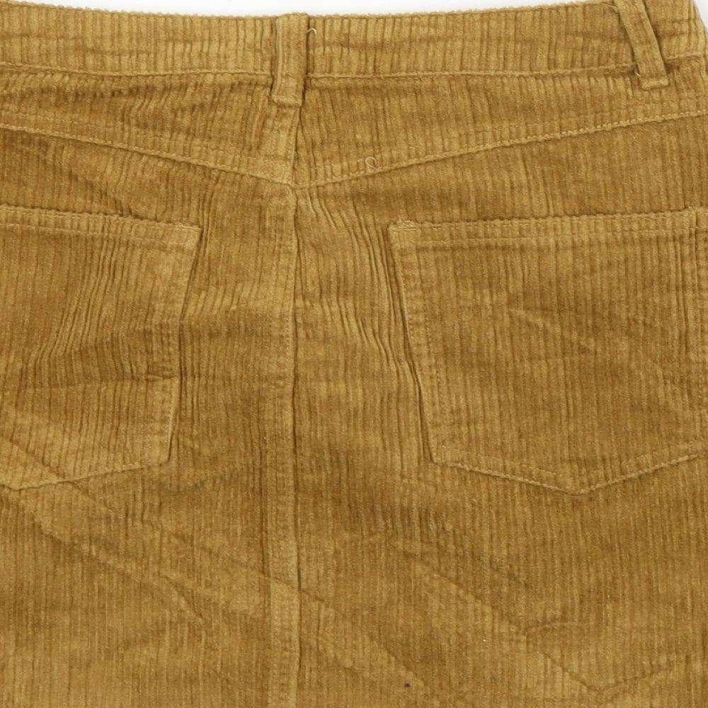 Brand and care label for Missguided women’s brown a-line skirt, size UK 6