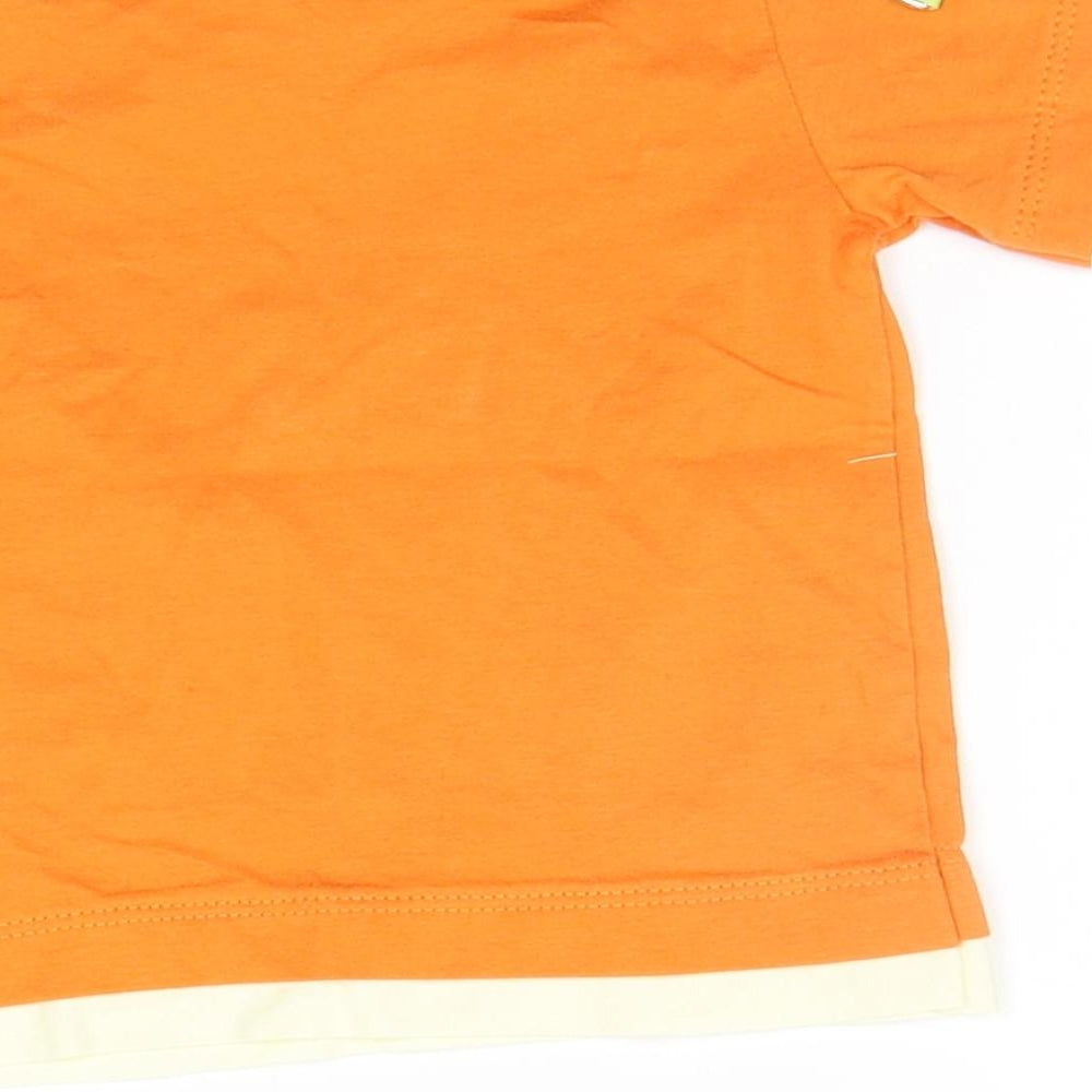 Brand and care label for Baby Line boys’ orange houndstooth basic polo, size 9-12, months